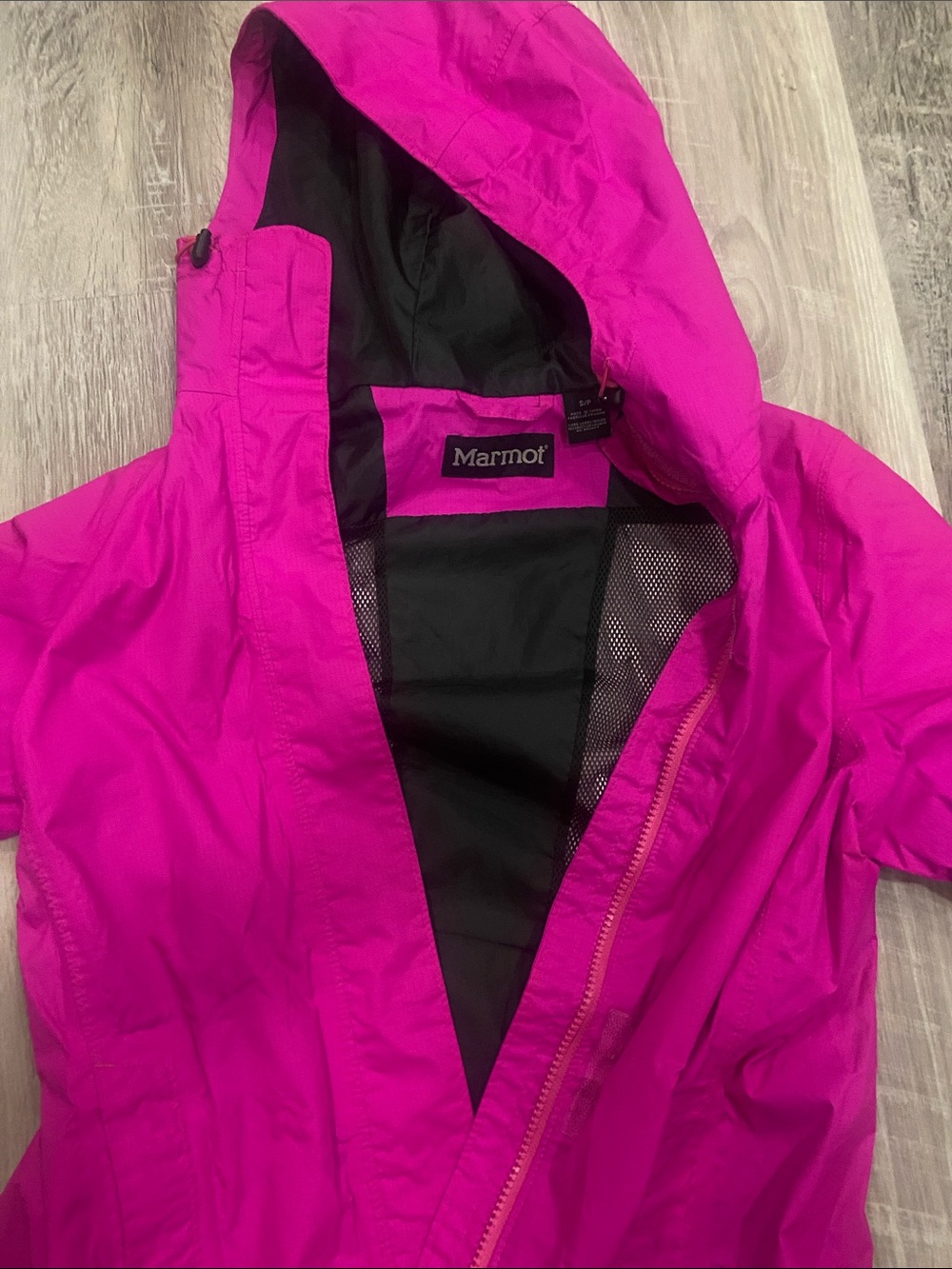 Marmot Kids Hooded Rain Jacket in Hot Pink gently worn inside lining worn.